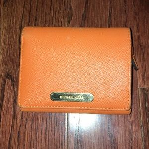 Orange leather Micheal Kors wallet